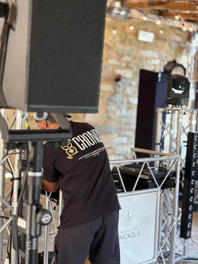 Speakers and moving heads on truss, before the sound check